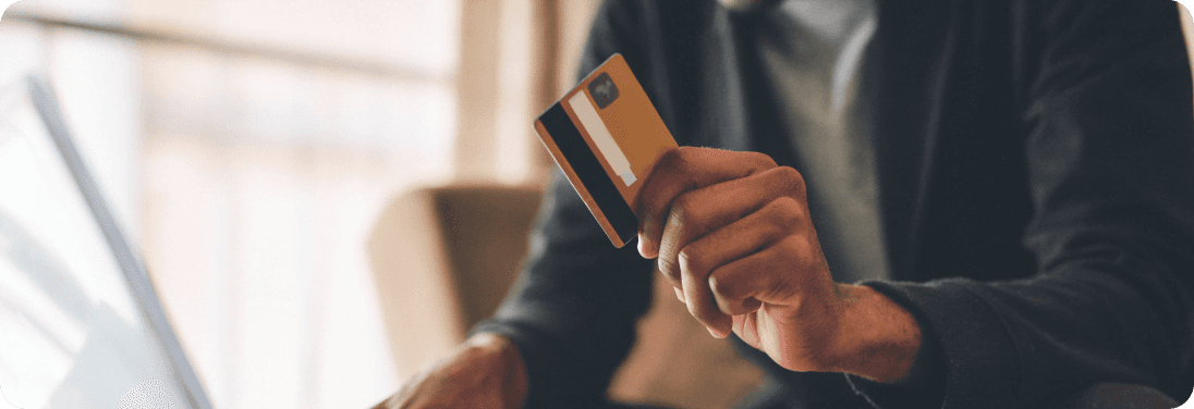 Man's hand hold credit card